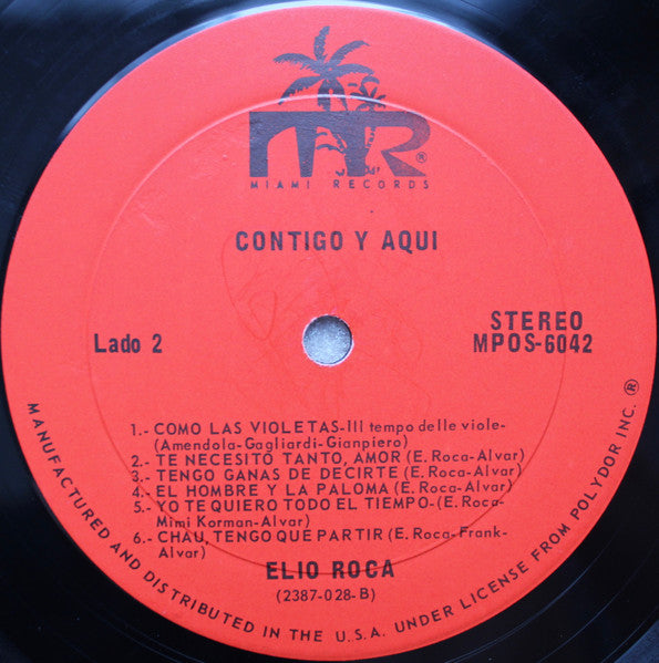 Contigo y aquí